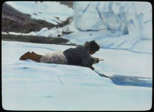 Image of Eskimo [Inuk] Boy [Ood-dee] Fishing